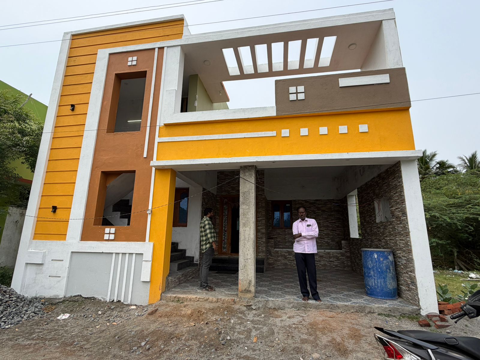 Completed contemporary G+1 villa with bold yellow facade in Kumbakonam